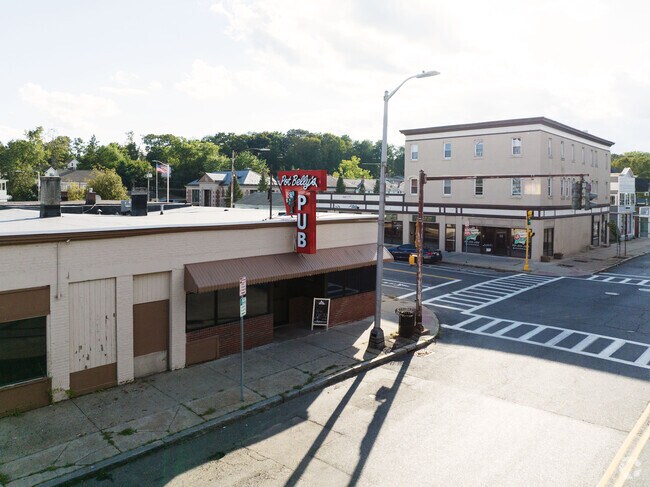 Pot Belly's Pub and a view of the downtown area of Indian Orchard.