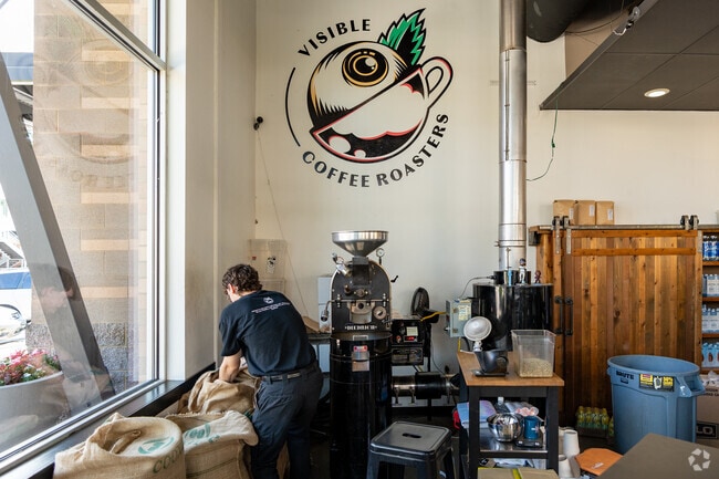 Witness skilled artisans handcrafting coffee at Visible Coffee Roasters in Mill Creek East.