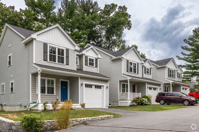 A row of newly built townhomes found in the Golden Triangle neighborhood of Chelmsford, MA.