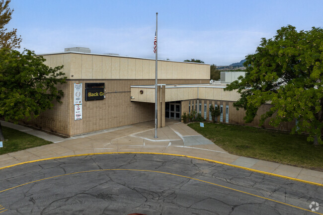 The American flag is displayed at the entrance of Green Acres Elementary School.