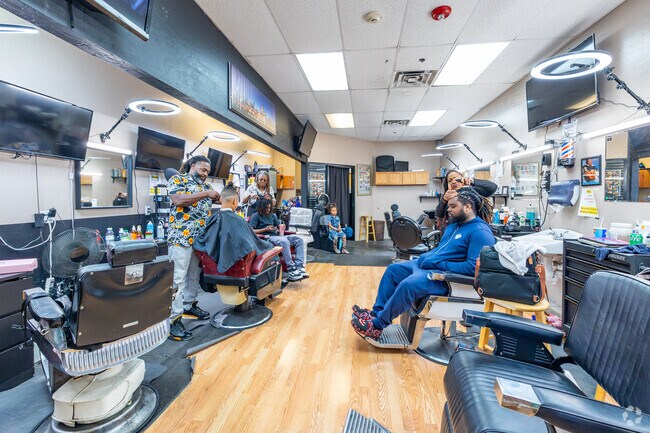 Experience top-notch grooming services at Chi-Town Barber Shop & Salon near Glennwilde Groves.