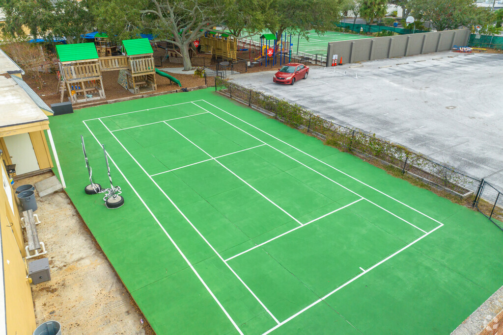 Washburn Academy has a little tennis court.