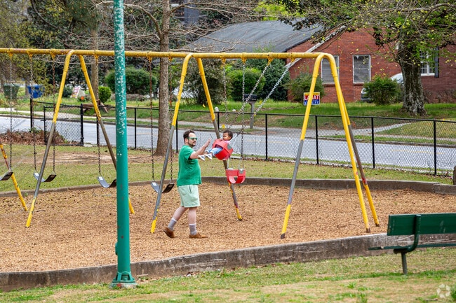 Bring the kids out to swing on the West Manor Park swingset.