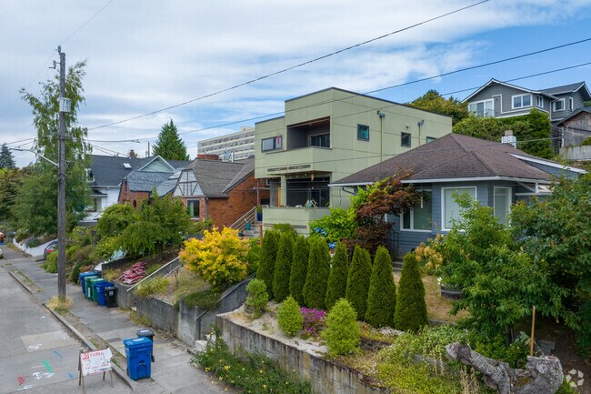 Larger contemporary homes share streets with classic cabins and cottages in Phinney Ridge.