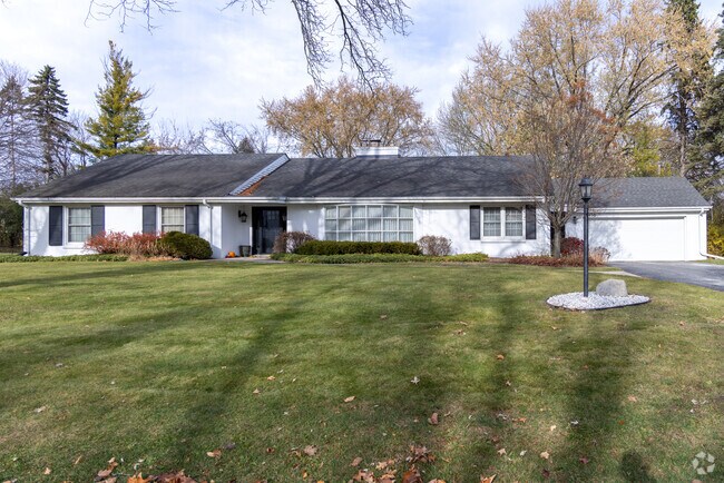 Ranch-style living is a staple in River Edge, where broad front yards and simple landscaping define the neighborhood.