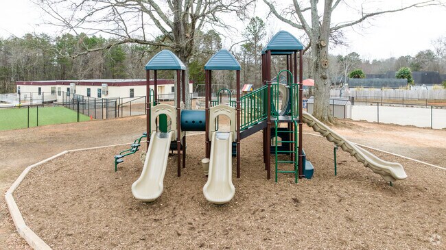 Students enjoy the playground during recess at Denver Christian Academy.