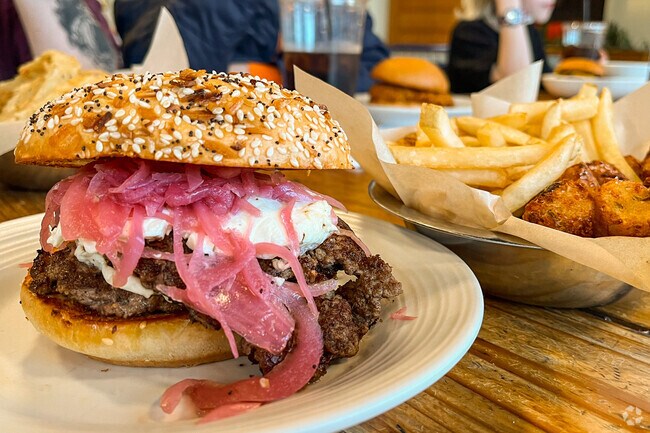 Try the Everything Burger at Society in Ridge Pointe with a side of cheddar jalapeno tater tots.