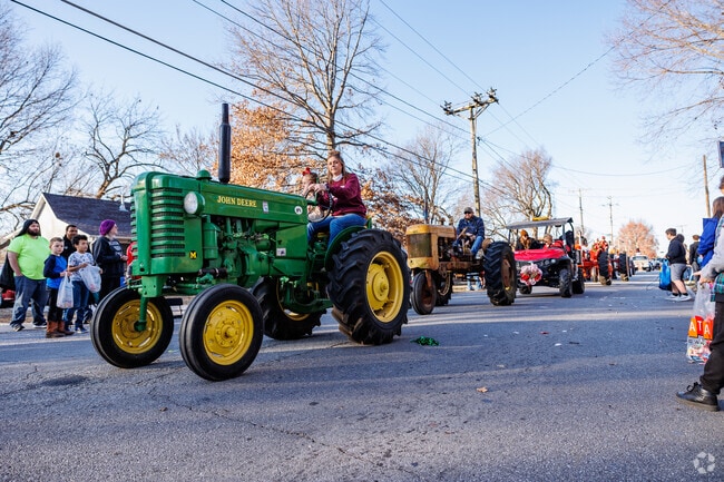 Local farmers show off old tractors at Christmas on Main Street.