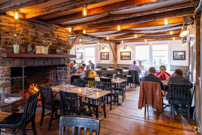 The main dining room of the Farmer and the Fish in North Salem oozes welcoming vibes.