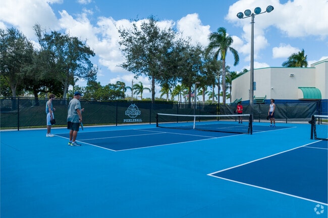 Wynmoor residents enjoy playing pickleball.