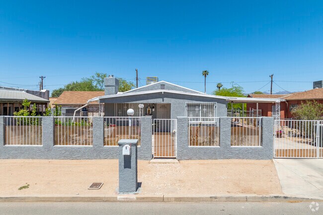 The neighborhood of Sunset Villa showcases ranch-style homes with open floor plans and attached garages, reflecting the practical elegance of mid-20th-century architecture.