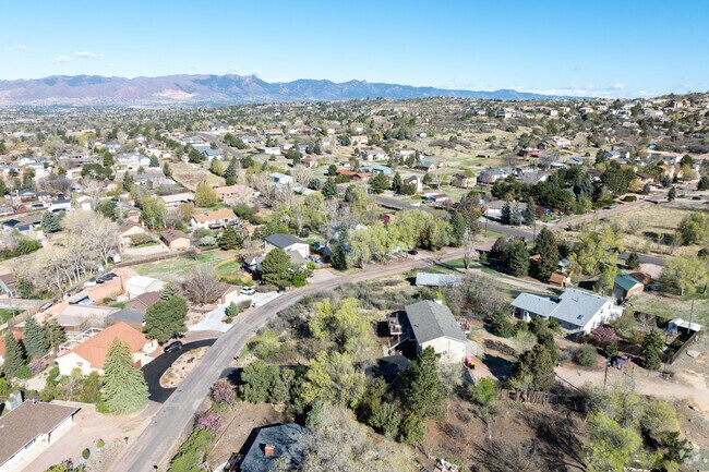 There are several homes up on the hills of Old Farms with large lots.