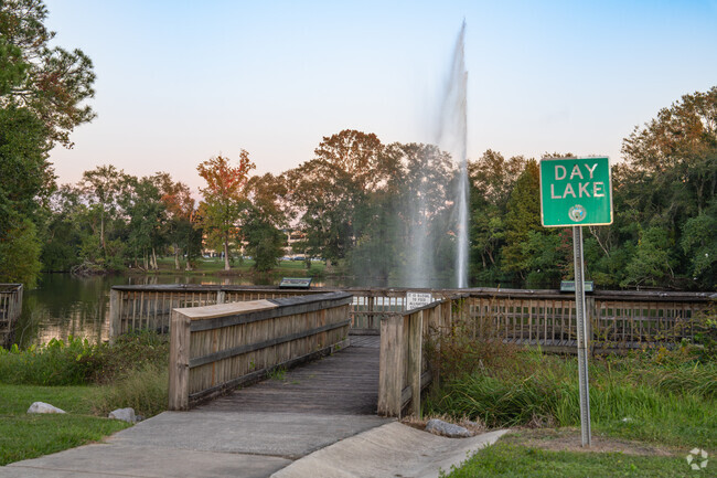 Owens' Tricentennial Park's scenic Day Lake is a wildlife haven, home to alligators and turtles.