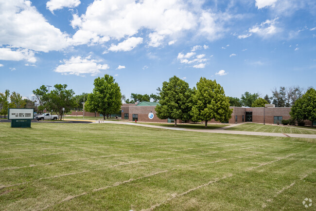 The sign and main building at Semper Elementary School in Broomfield, Colorado.
