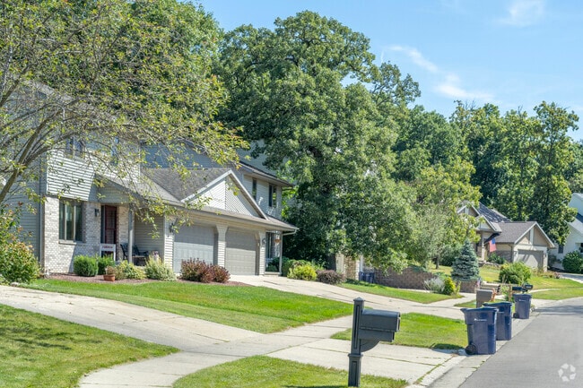 Briar Crest homes sit on larger lots, surrounded by mature tree growth.