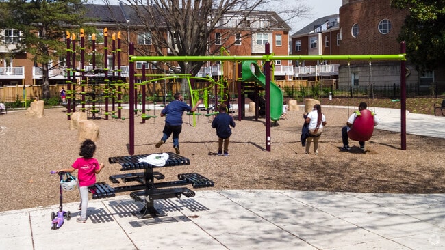Michigan Park Community Playground has swings, a jungle gym and is always busting with neighborhood kids.