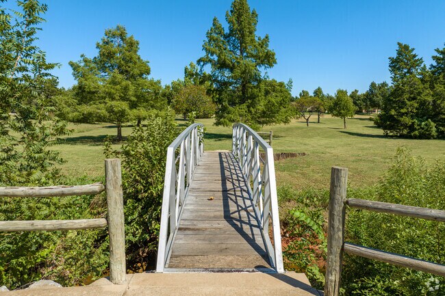 Start your evening walk around Berta Faye Rex Quail Creek Park at this bridge.