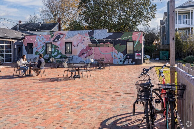 Locals enjoy sunny outdoor dining in the Vibe District at the Oceanfront.