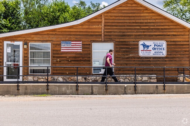 Montreal residents stop by the local post office while running errands.