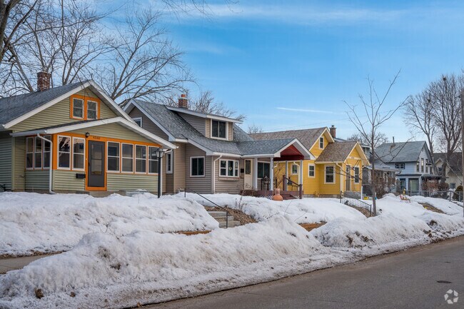 Various craftsman-style houses of various colors in the Northrop neighborhood.