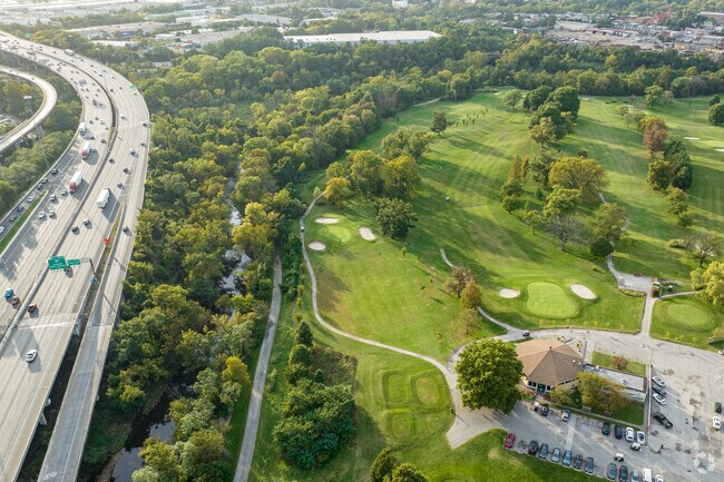 The nine-hole golf course at Carroll Park offers residents a respite from the hustle and bustle.