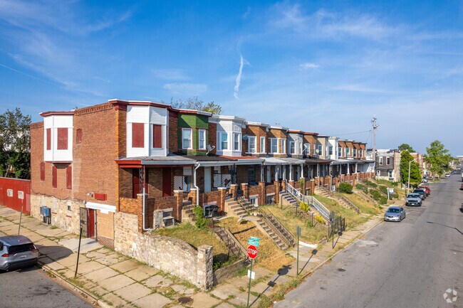 Large, second floor bay windows are a common feature of the rowhomes in Coppin Heights.