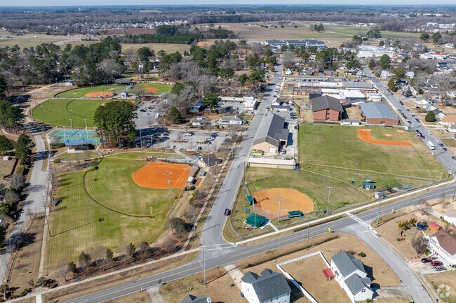 Winterville Recreation Park is comprised of 3 youth baseball fields, a large adult softball field, an amphitheater, 1/4 mile walking trail, newly renovated playground, 2 concession stands, roofed and lighted batting cages, 1 large pavilion and public restrooms.