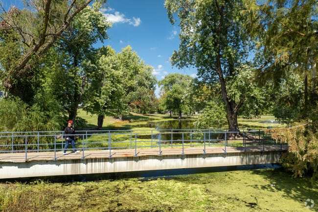 Scenic bridge and greenery add natural beauty to Independence Community College grounds.
