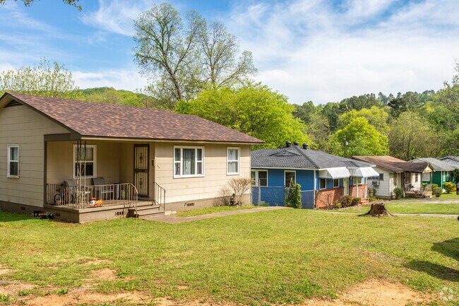 Admire this row of homes showcasing the architectural style of Oak Ridge Park.