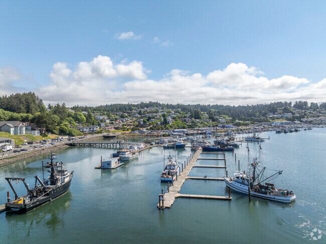 The marina is nestled along the waterfront, offering picturesque views of the bay.