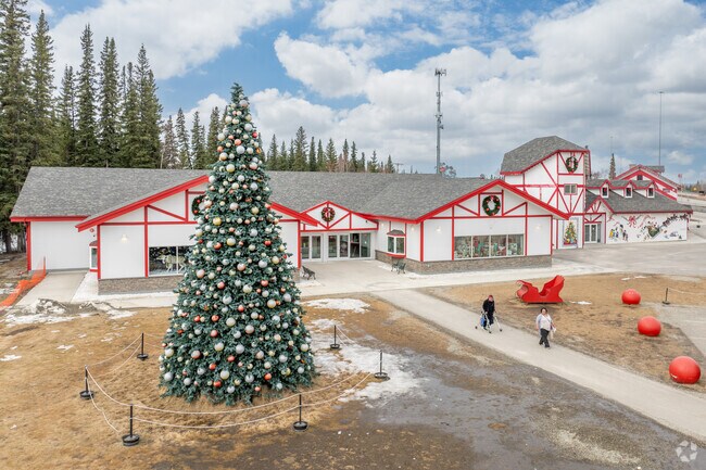 Giant Christmas décor brightens the North Pole Store courtyard in Badger.