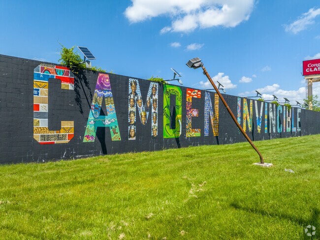 Downtown Camden is home to inspirational murals that brighten residents days.