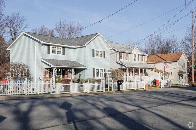 A street of well-maintained, colonial-style homes in Jermyn, Pennsylvania.