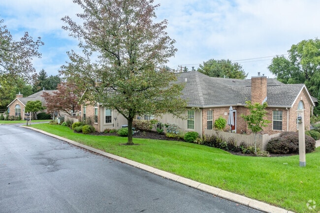 Twin homes with yard space and private garages can be found in Orchard Park.