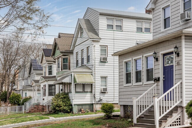 Nineteenth and early 20th-century homes in Watsessing are packed together on small lots that are full of well-kept gardens and shrubs.