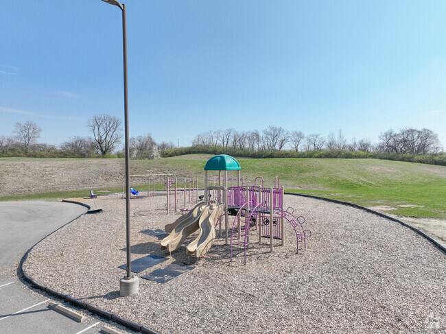 There is a playground for the students near the back of the building.