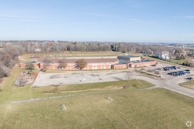 Younger children might attend Sunset Ridge Elementary School.