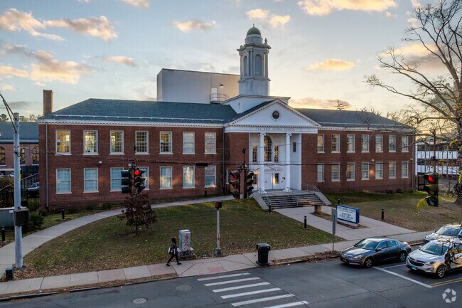 People enjoy walking on the streets of Asylum Hills in Hartford, CT.