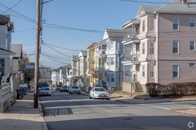 Narrow streets with triple-deckers make the Flint neighborhood a closely knit area.