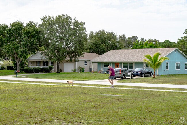 Walk your dog along the sidewalks at Easy Street Park in Sebastian Highlands..
