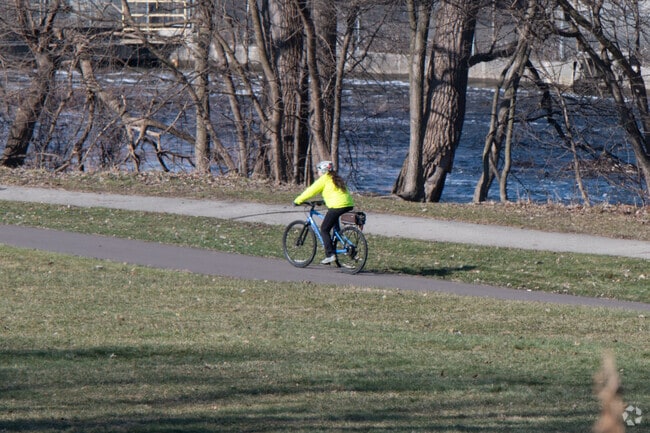 The Lansing River Trail can be accessed at Moores Park, located near Greencroft Park.