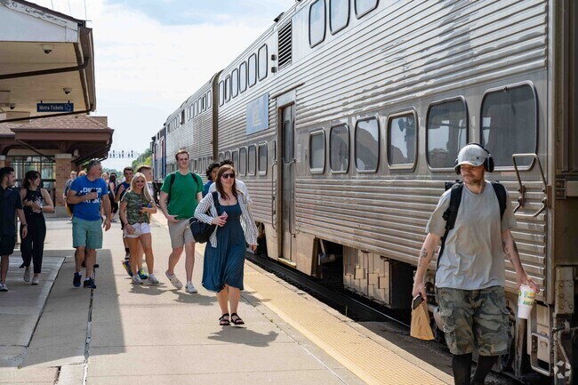 The Metra Route 59 Station near Saddle Creek is roughly a 50 minute trip to Downtown Chicago.