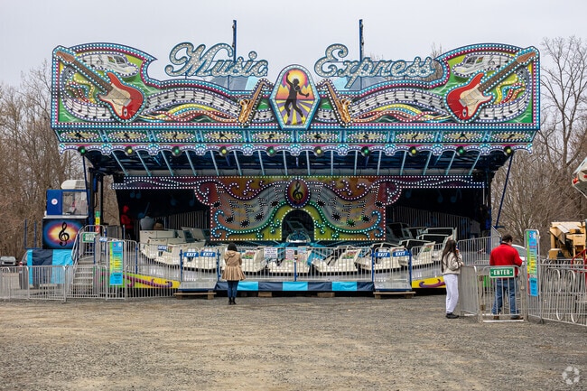 The Music Express is a flying bobs ride on the Coleman Brothers Carnival Midway near Westfield.