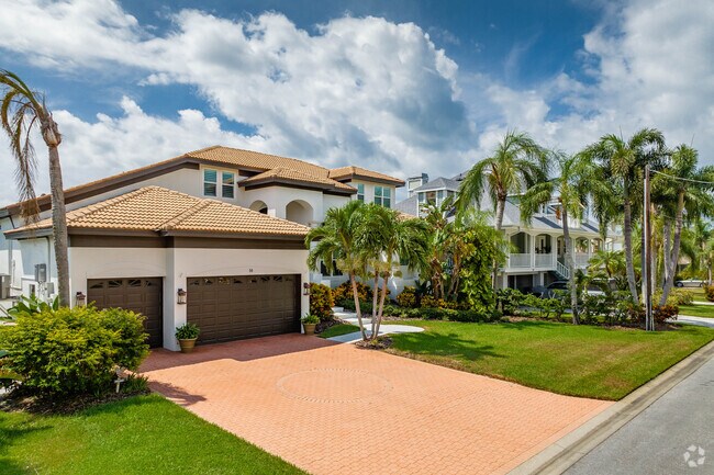 Belleair Bluffs boasts waterfront estates priced from $2 million, offering luxury and privacy.