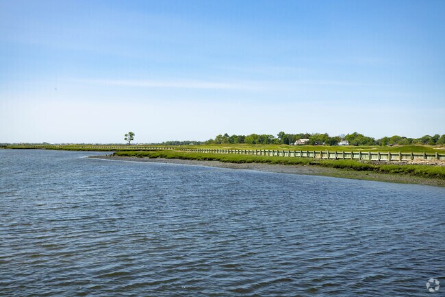 Woodsburgh is bordered by peaceful bays that define its coastal charm.