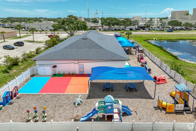 Wellington Academy has a colorful playfground surrounding it.