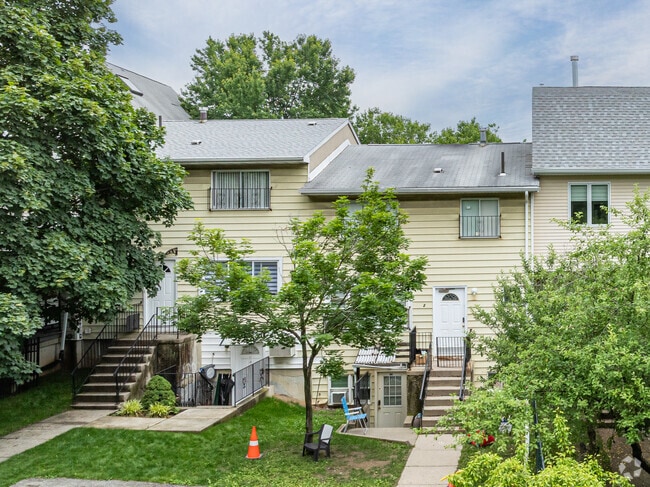 In older areas of Kiryas Joel, single-family homes have been repurposed into multiple apartments to accommodate population growth.