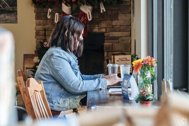 A Youngwood resident finds a quiet spot to work over a chilled coffee drink at The Daily Grind.