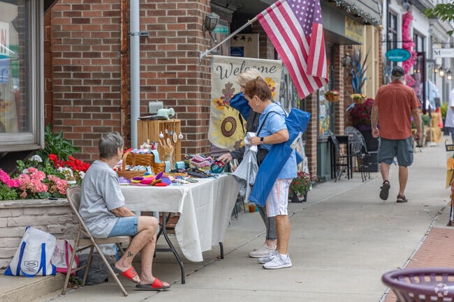 Residents browse vendors and enjoy local flavors at Zelienople Open Air Market.
