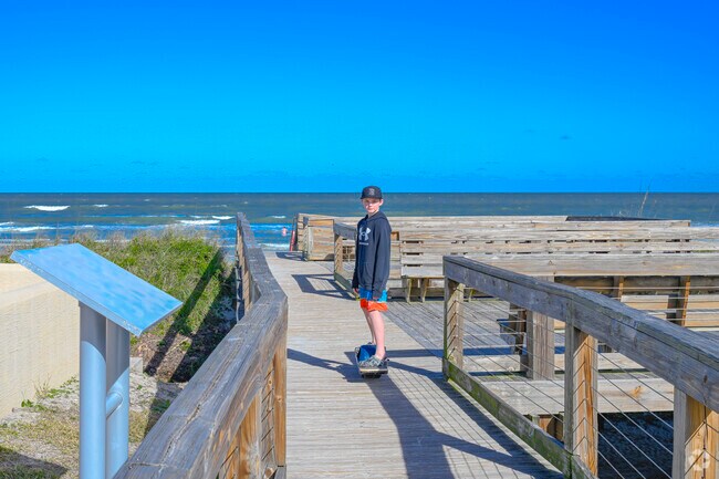 Use the boardwalk to cross the dunes to the ocean at Esther Street Beachfront Park.